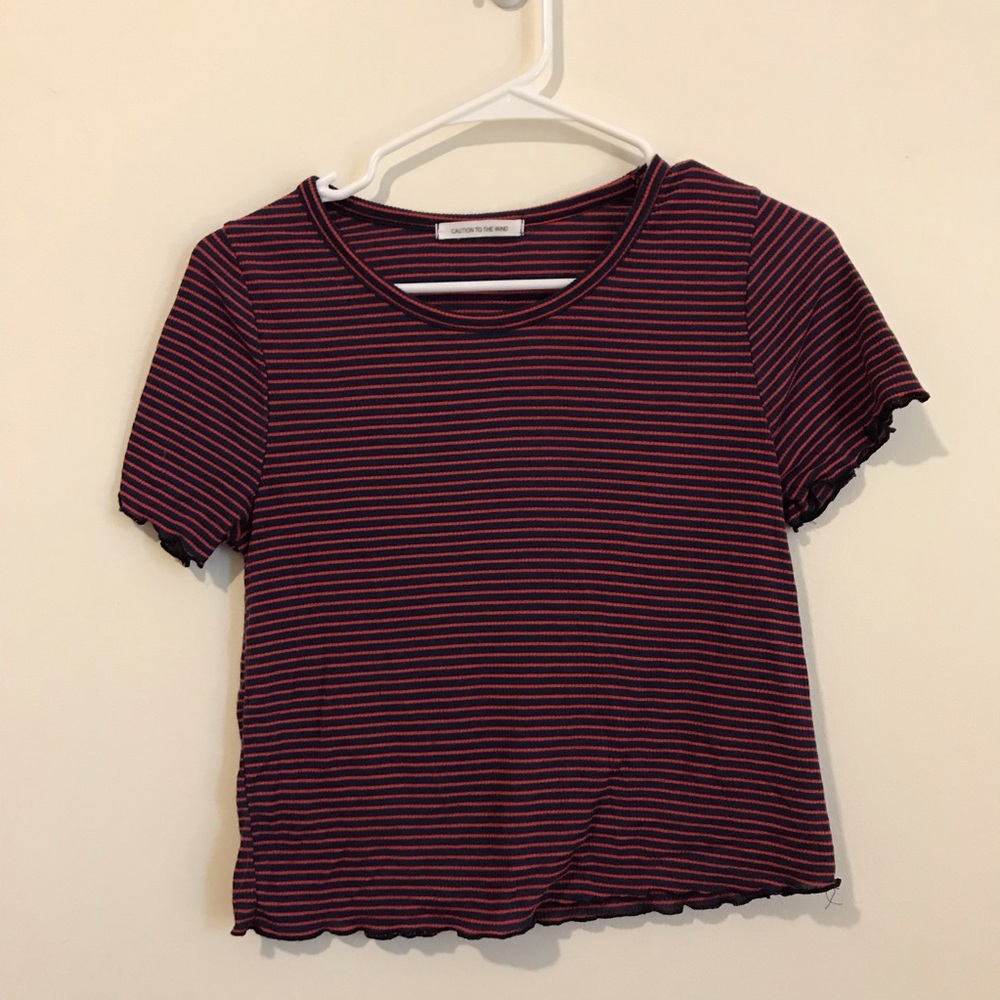 Blue and red striped t shirt with detail on hem